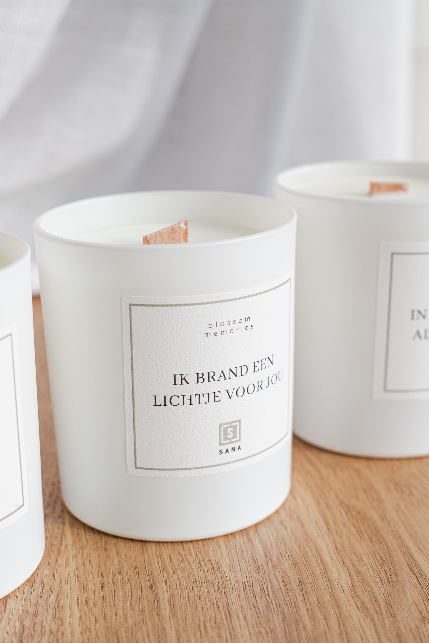 Kaars wit geurkaars herdenkingskaars woodwick dood rouw verlies rouwcadeau ster sterrekindje sterretje geschenk geliefde gemis ik brand een lichtje voor je