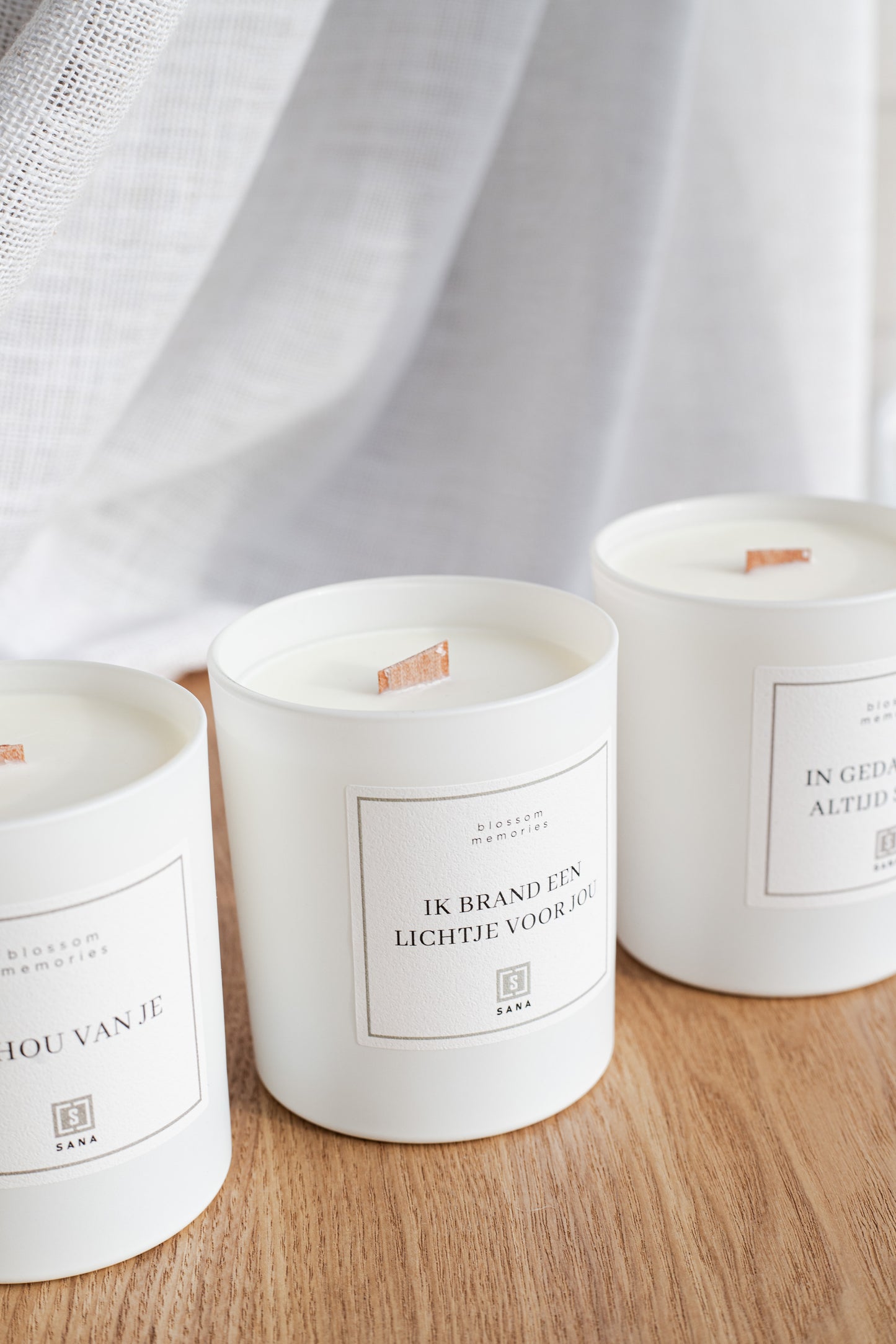 Kaars wit geurkaars herdenkingskaars woodwick dood rouw verlies rouwcadeau ster sterrekindje sterretje geschenk geliefde gemis ik brand een lichtje voor je